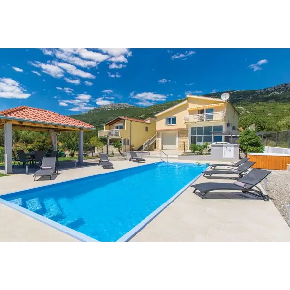 Blå rektangulär pool med grå kanter, Jamaika glasfiberpool 25x3 75x1 50m