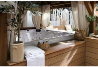 PassionSpa Admire Whirlpool – weißer Innenraum, blaue LED-Beleuchtung, schwarzes Paneel
