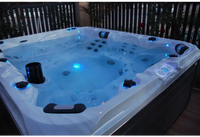 PassionSpa Desire Whirlpool – weiße Ausführung, weißer Innenraum, blaue LED-Beleuchtung, schwarze Akzente