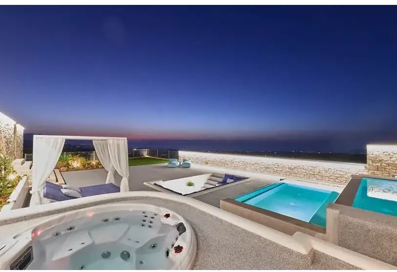 PassionSpa Recharge Whirlpool – weiße Ausführung, blaues Wasser, rote Massagestrahlen