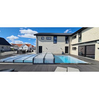 Modernt beige tegelhus med Pooltaket Icon sarg klarplast antracit