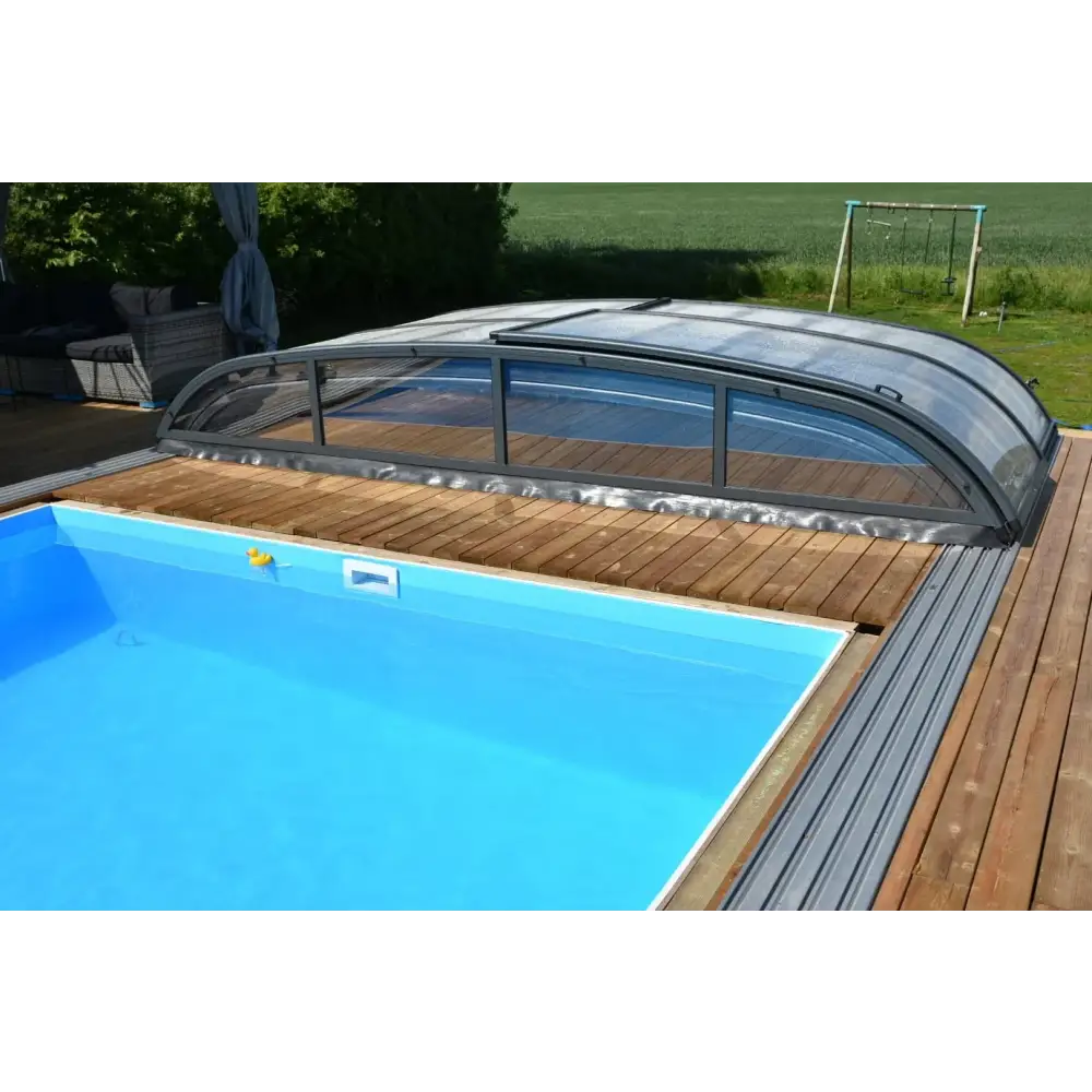 Pooltak Nivo Kit 750B med bågad glastak över rektangulär pool