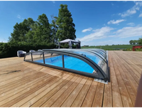 Modern bågad pooltak Nivo Kit 750B i glas med svart ram för pooler