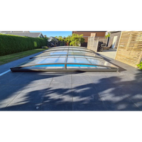 Modern pooltak Sydney i blåtonat glas med slank antracit metallram