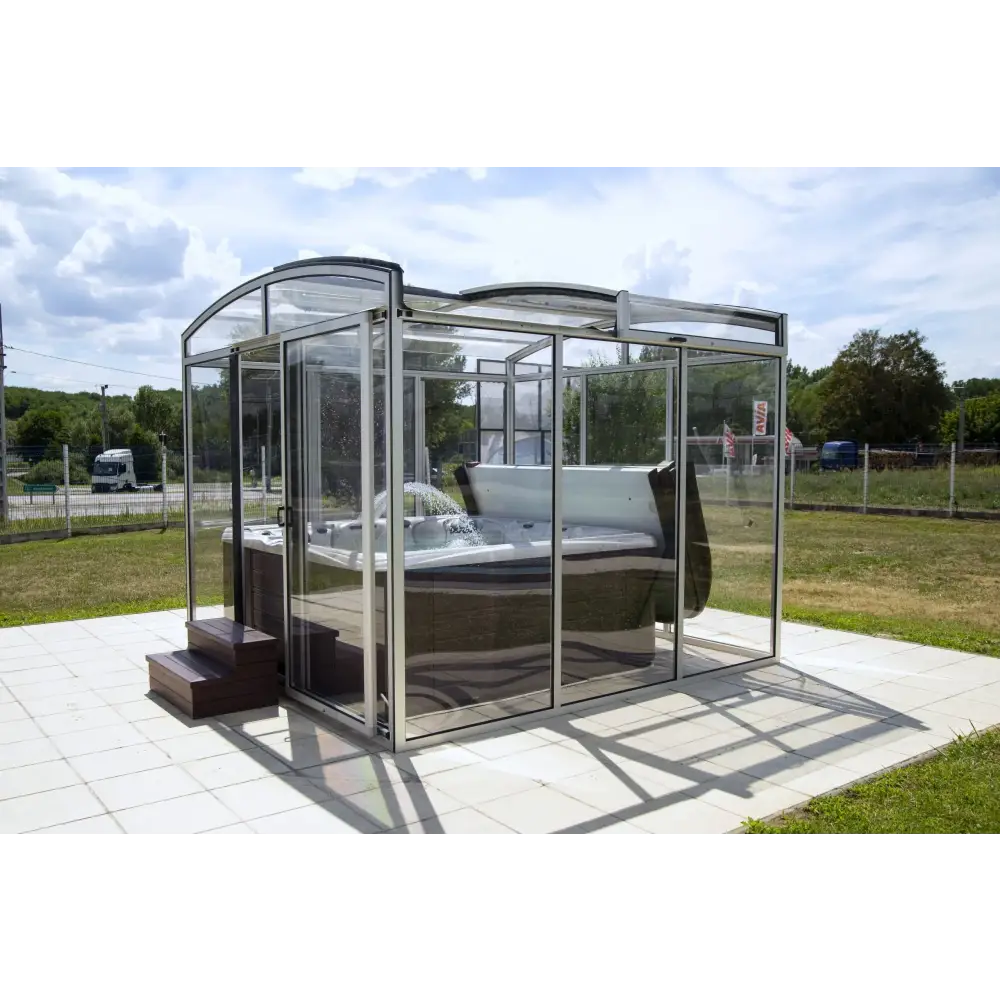 Spatak Luminosa med bågformad glasinrättning och mörkgrått bubbelbad